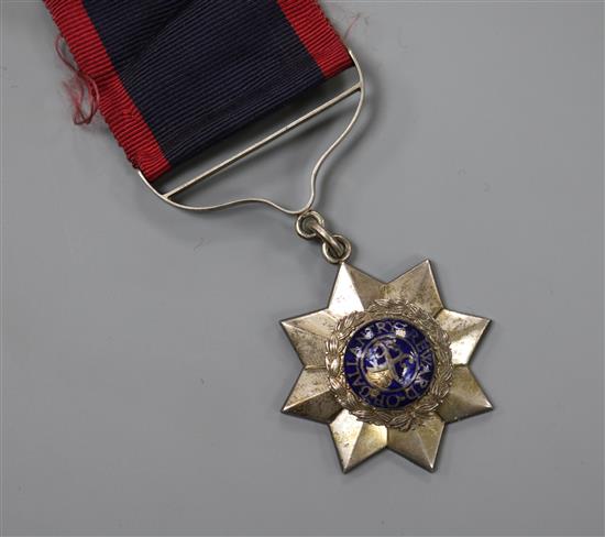 An Indian Order of Merit in silver, stamped verso 2nd Class Order of Merit, fixing nut missing with chips